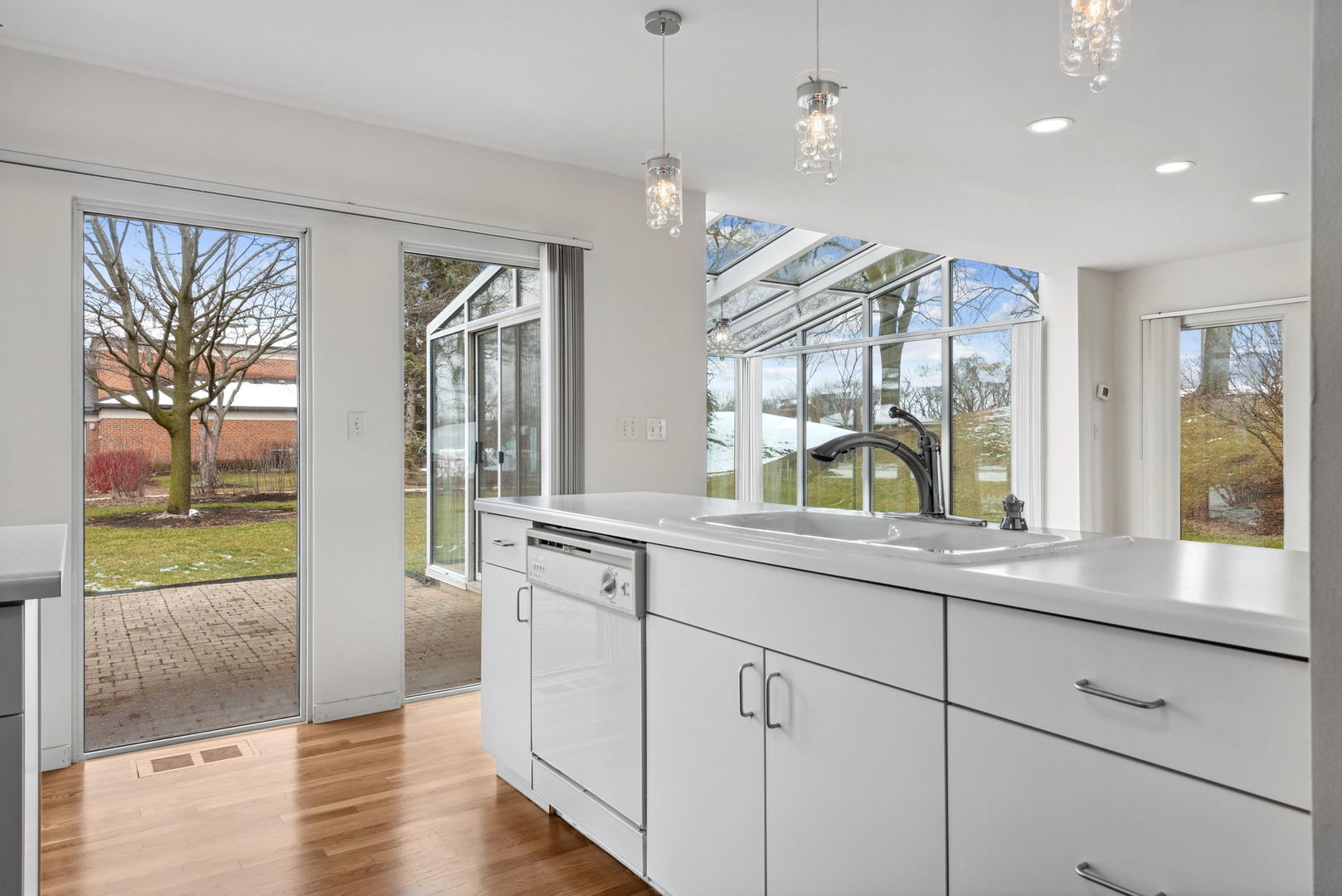 357 Milford Road Deerfield, IL 60015 - Photo 13 of 31 a kitchen with a sink and a large window
