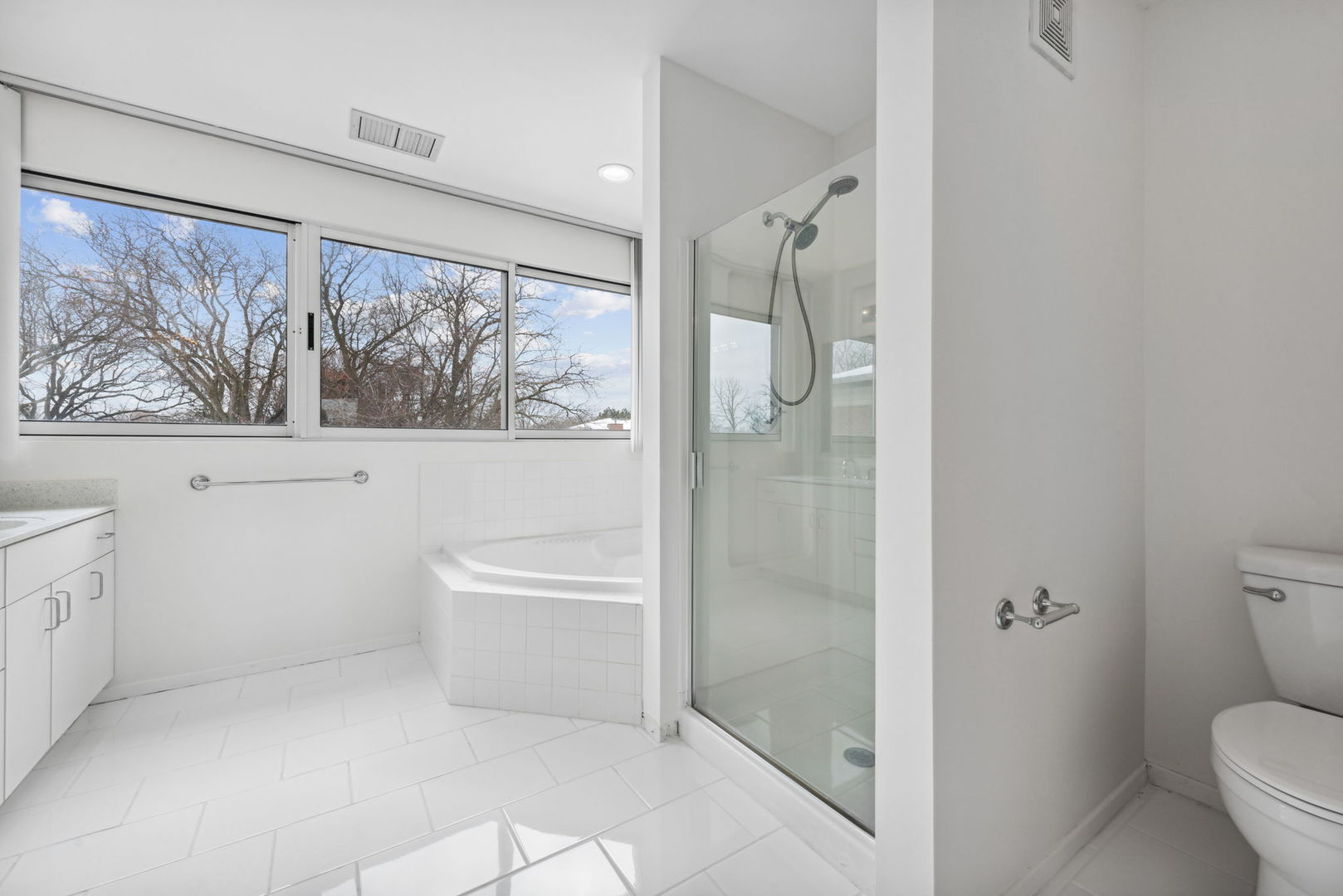 357 Milford Road Deerfield, IL 60015 - Photo 18 of 31 a bathroom with a toilet and a shower
