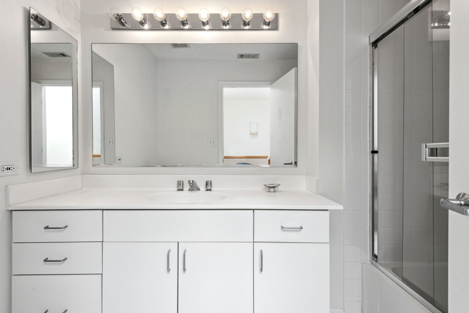 357 Milford Road Deerfield, IL 60015 - Photo 21 of 31 a bathroom with a sink and a mirror