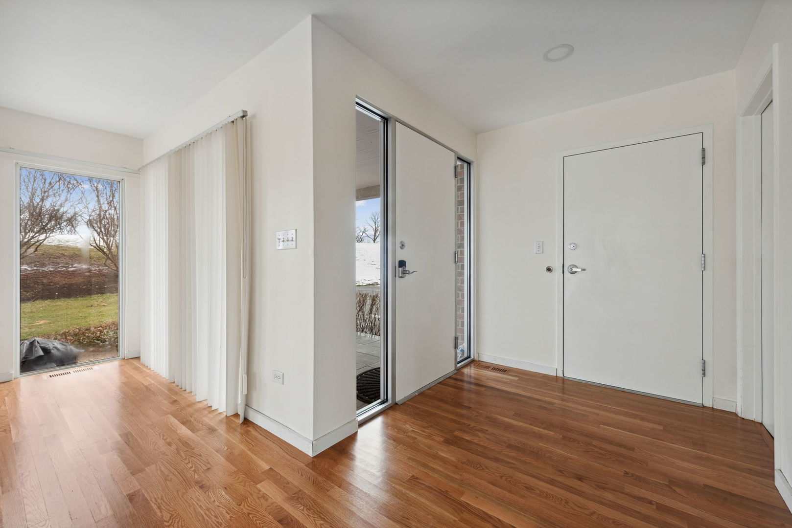 357 Milford Road Deerfield, IL 60015 - Photo 4 of 31 a view of a bathroom with wooden floor and a shower
