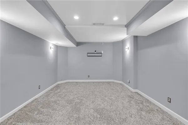 an empty room with a hallway