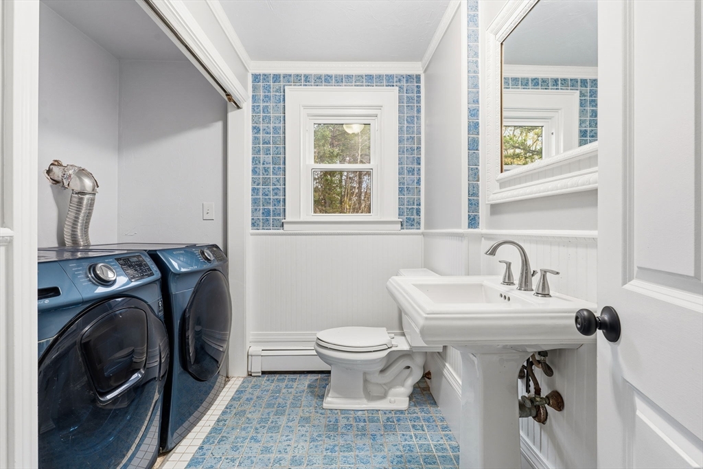17 Colonial Drive Mendon, MA 01756 - Photo 26 of 42 a bathroom with a sink toilet and a mirror