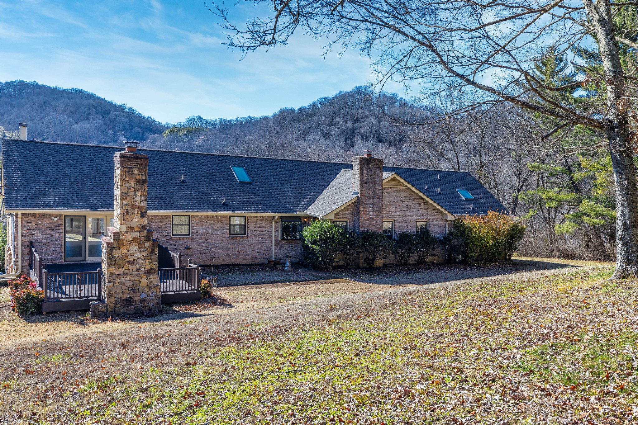 1002 Holly Tree Gap Road Brentwood, TN 37027 - Photo 21 of 27 a front view of a house with garden