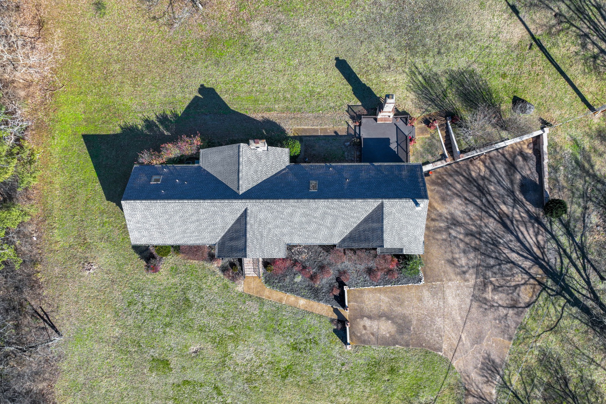 1002 Holly Tree Gap Road Brentwood, TN 37027 - Photo 25 of 27 an aerial view of a house with table and chairs