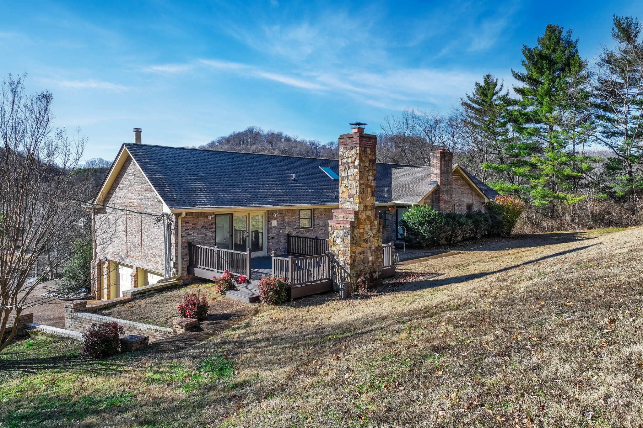 1002 Holly Tree Gap Road Brentwood, TN 37027 - Photo 27 of 27 a view of a house with backyard and sitting area