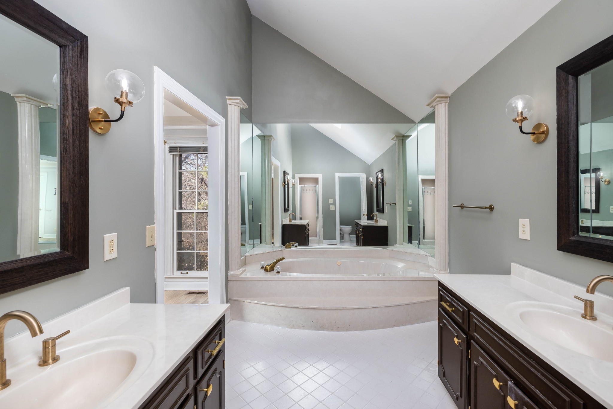 1002 Holly Tree Gap Road Brentwood, TN 37027 - Photo 10 of 27 a bathroom with a granite countertop sink mirror and double