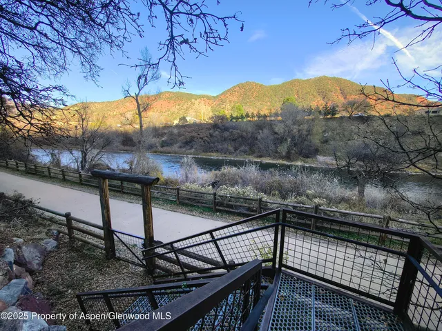 a view of a balcony with an outdoor space