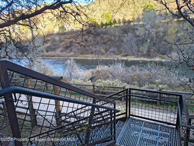 a view of a balcony with an outdoor space