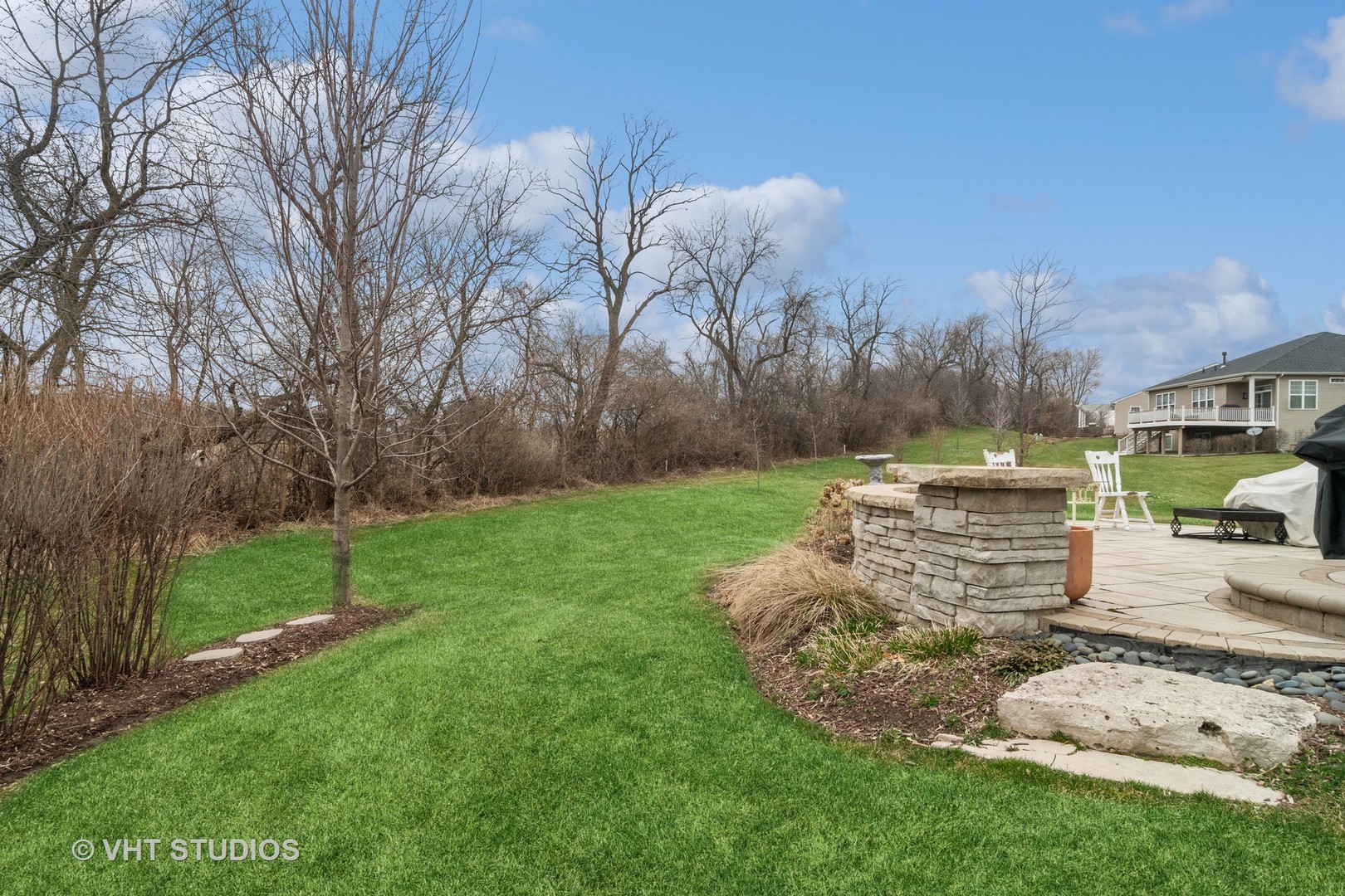 3870 Eagle Ridge Drive Elgin, IL 60124 - Photo 19 of 20 a view of a backyard with large trees