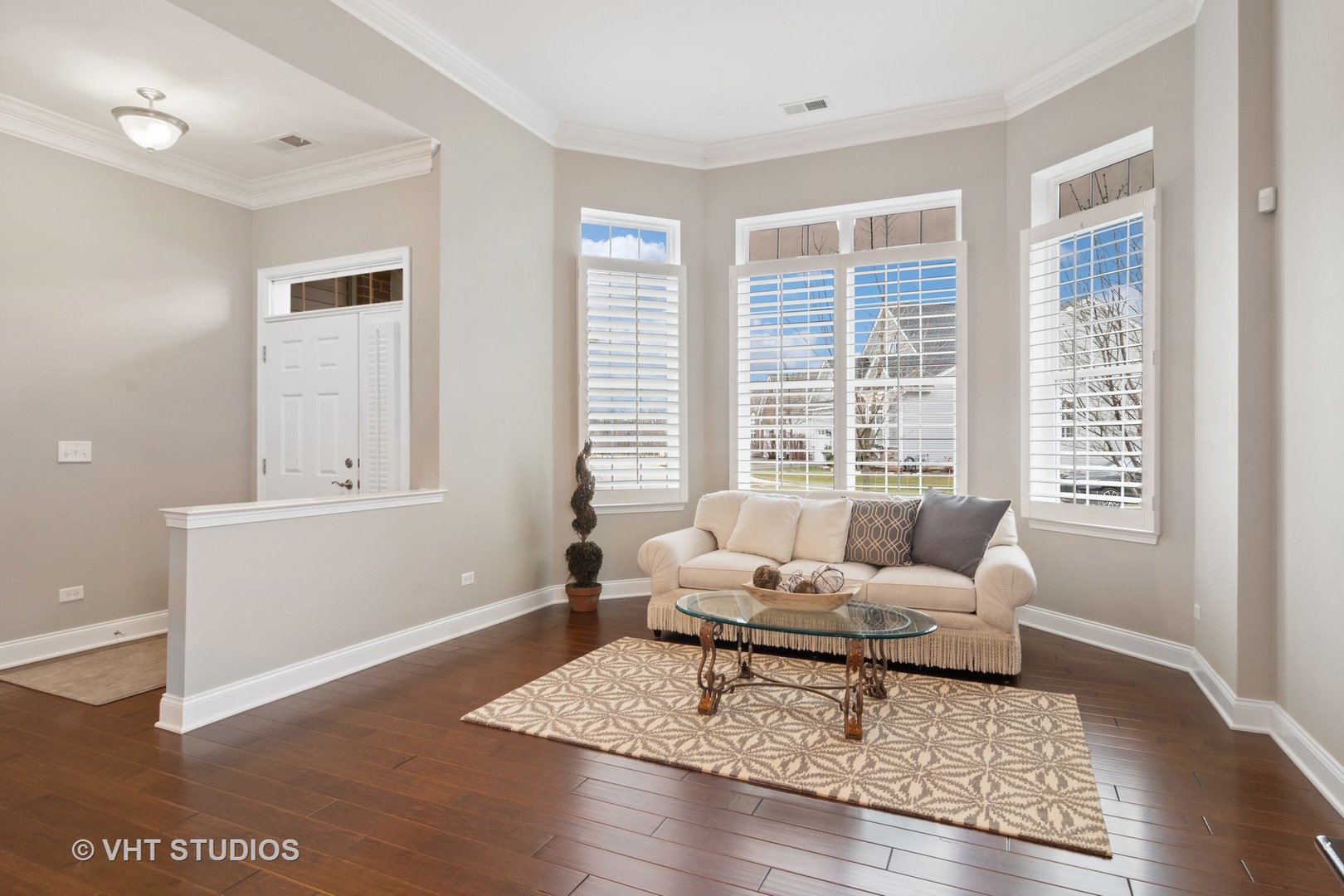 3870 Eagle Ridge Drive Elgin, IL 60124 - Photo 3 of 20 a living room with furniture and a window