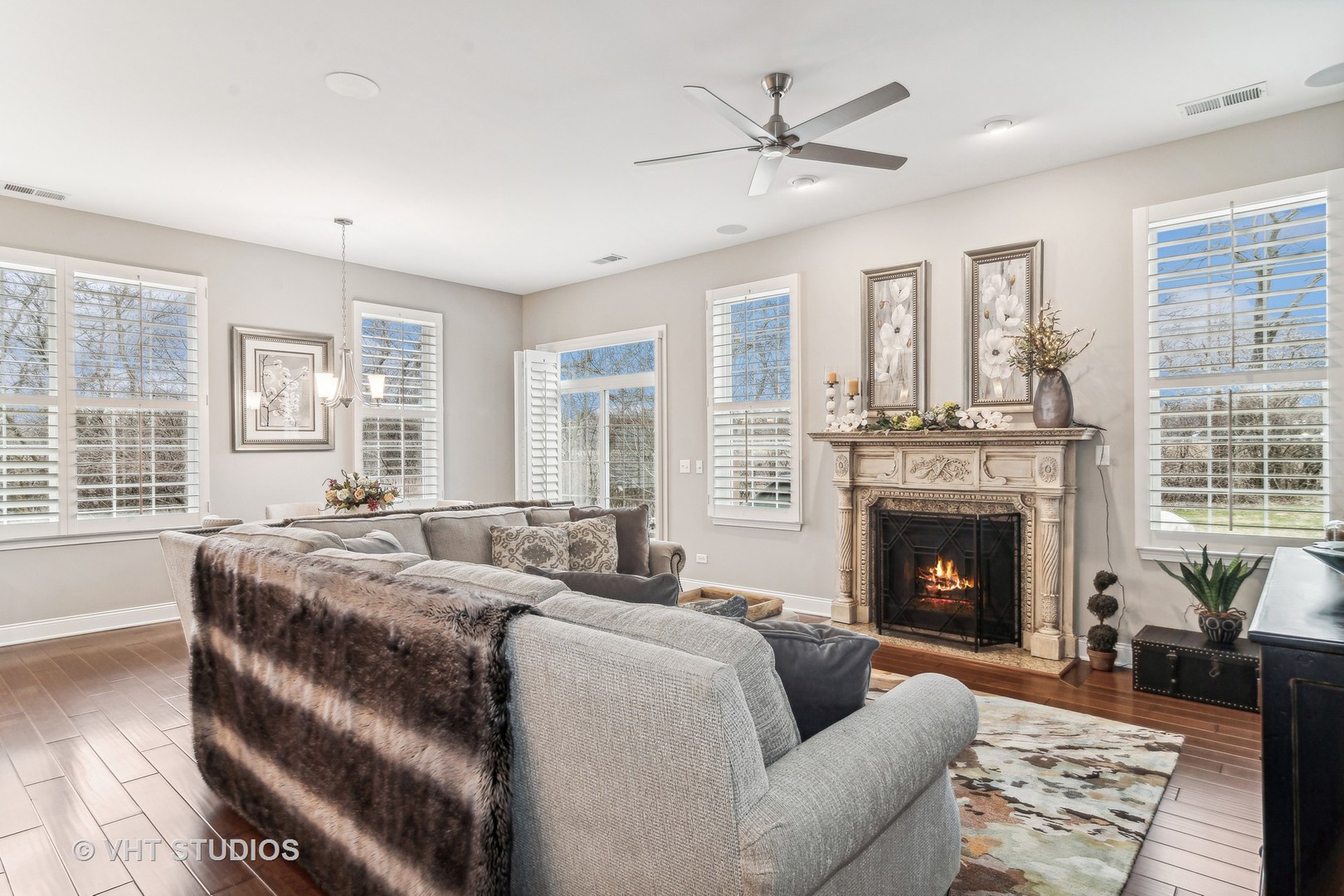 3870 Eagle Ridge Drive Elgin, IL 60124 - Photo 5 of 20 a bed room with a bed furniture and a fireplace