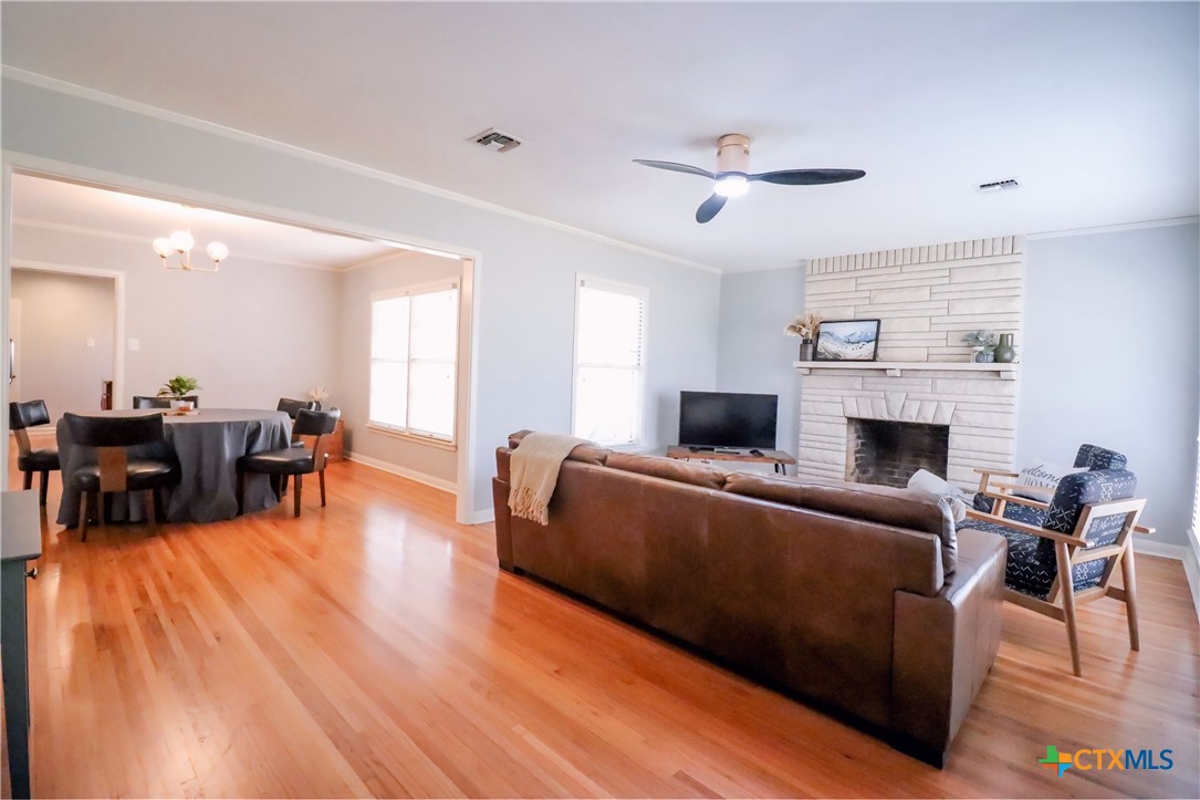 1902 North 7th Street Temple, TX 76501 - Photo 6 of 33 a living room with furniture and a fireplace