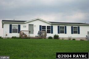 21 Leppo Mill Road Hanover, PA 17331 - Photo 1 of 2 a front view of a house with a yard and porch