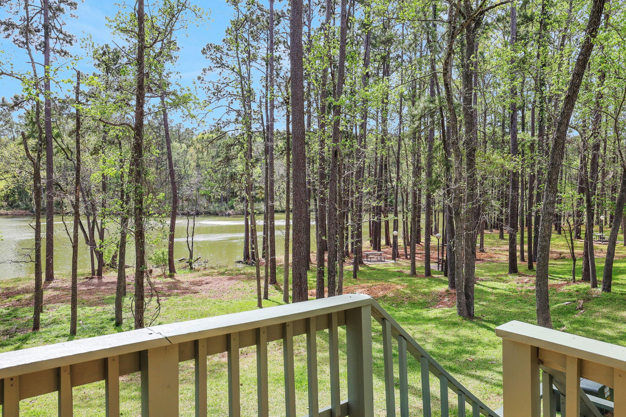 178 Villa Way Coldspring, TX 77331 - Photo 12 of 43 Step down from your back deck to the communal area around the marina lagoon - great for fishing, picnicking or watching the local wildlife