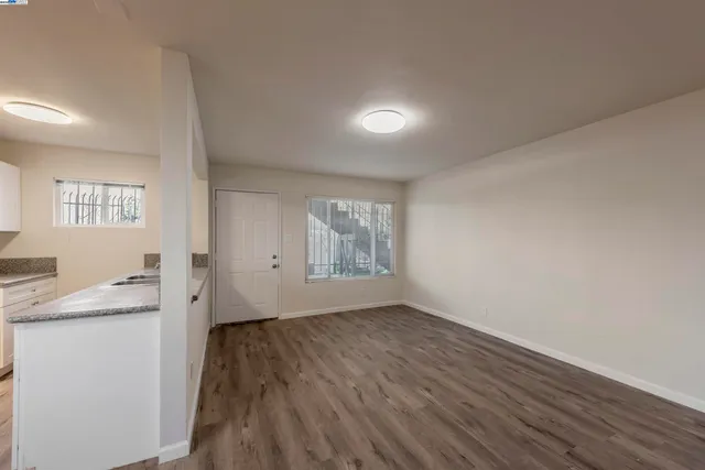 a view of livingroom with hardwood and hallway