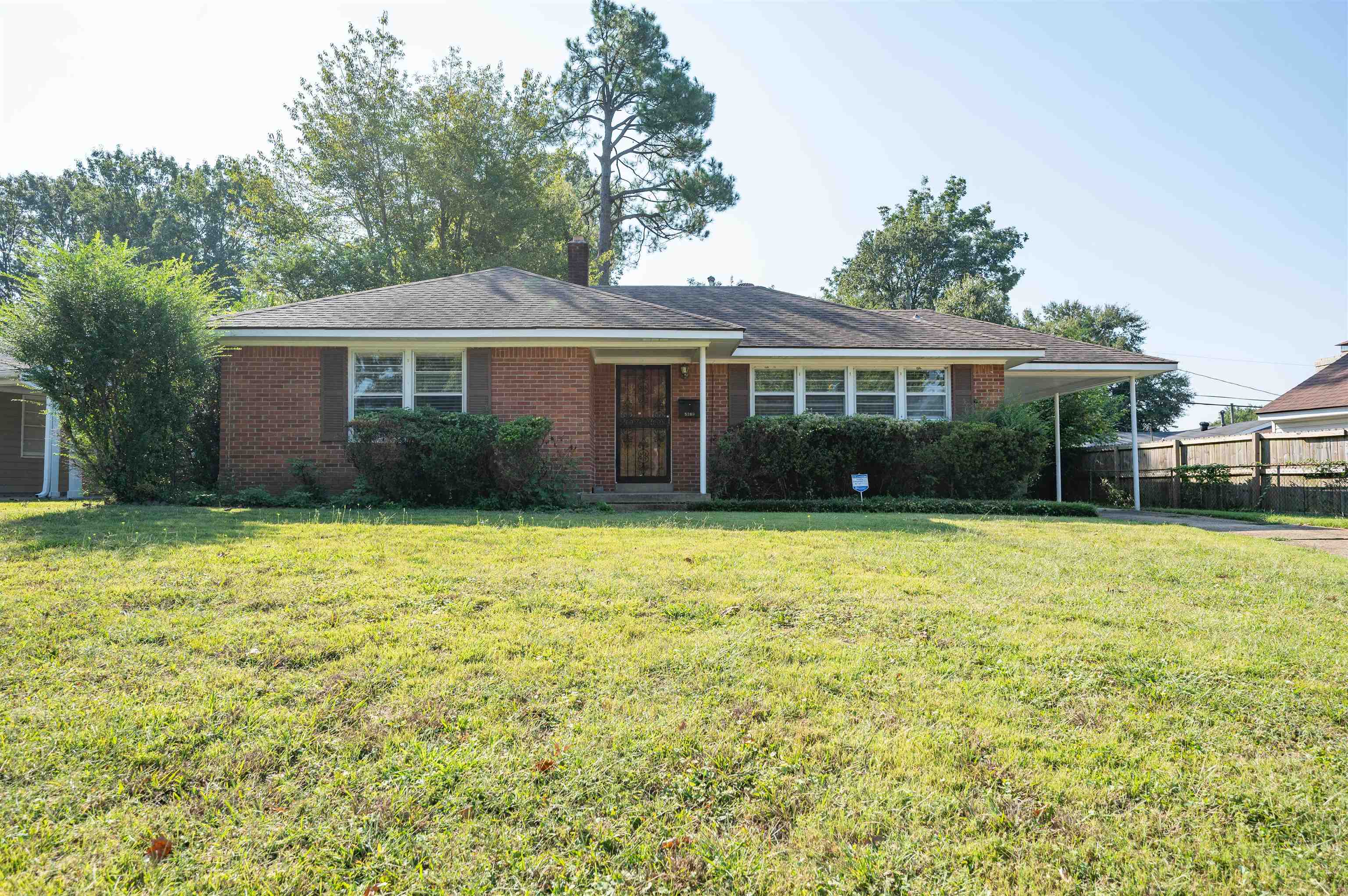 5189 Sea Isle Road Memphis, TN 38117 - Photo 16 of 16 Ranch-style house featuring a front yard
