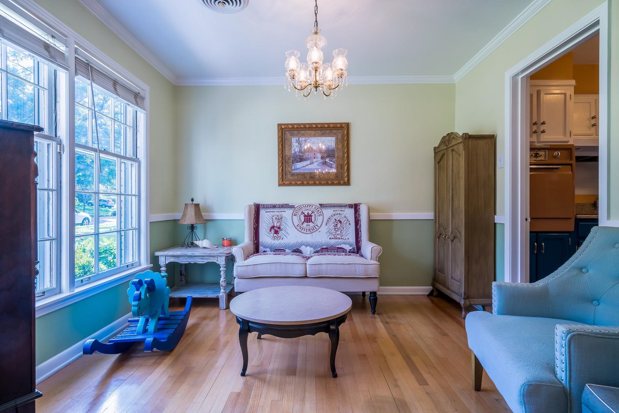 4937 Dee Road Memphis, TN 38117 - Photo 6 of 24 a living room with furniture a window and wooden floor