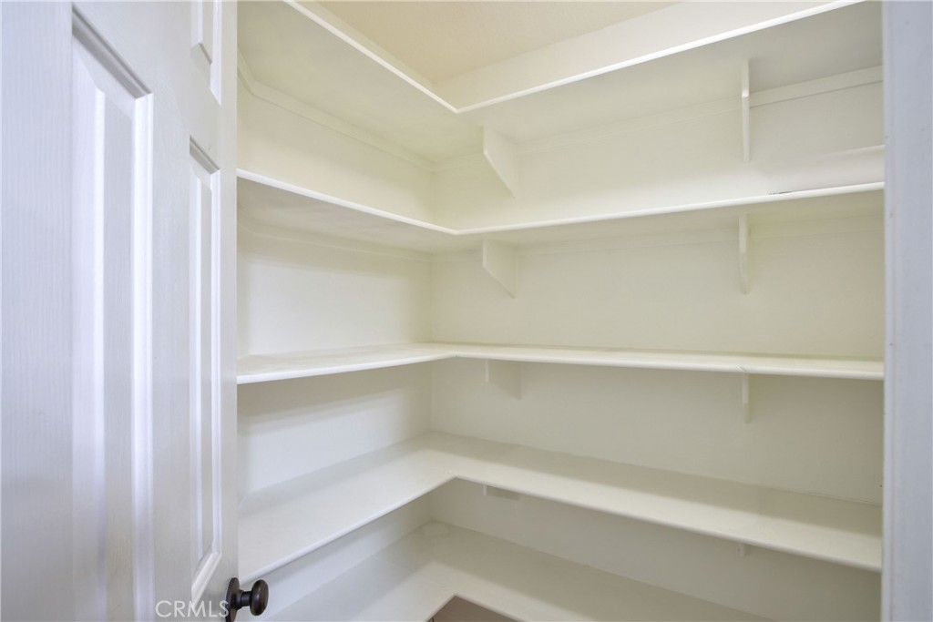 24055 Golden Pheasant Lane Murrieta, CA 92562 - Photo 14 of 38 a view of an empty walk in closet