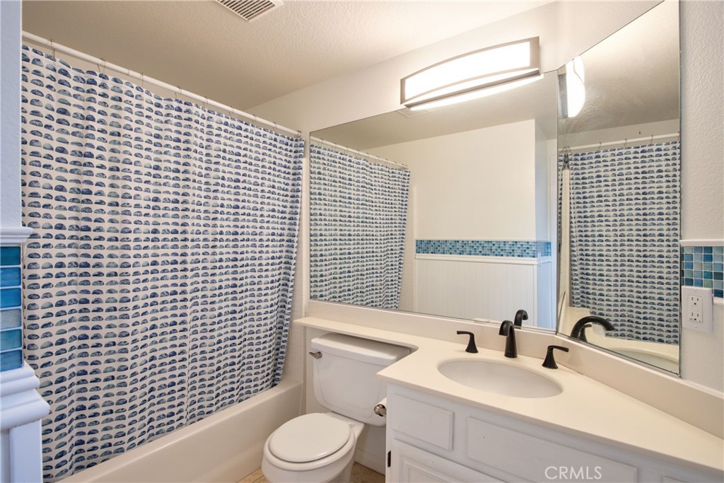 24055 Golden Pheasant Lane Murrieta, CA 92562 - Photo 17 of 38 a bathroom with a sink a toilet and shower