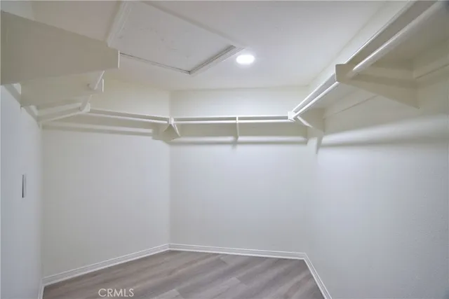 a view of an empty walk in closet