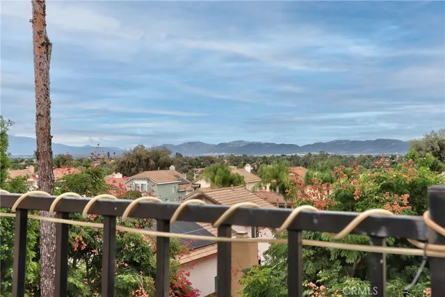 a view of a street with an outdoor seating