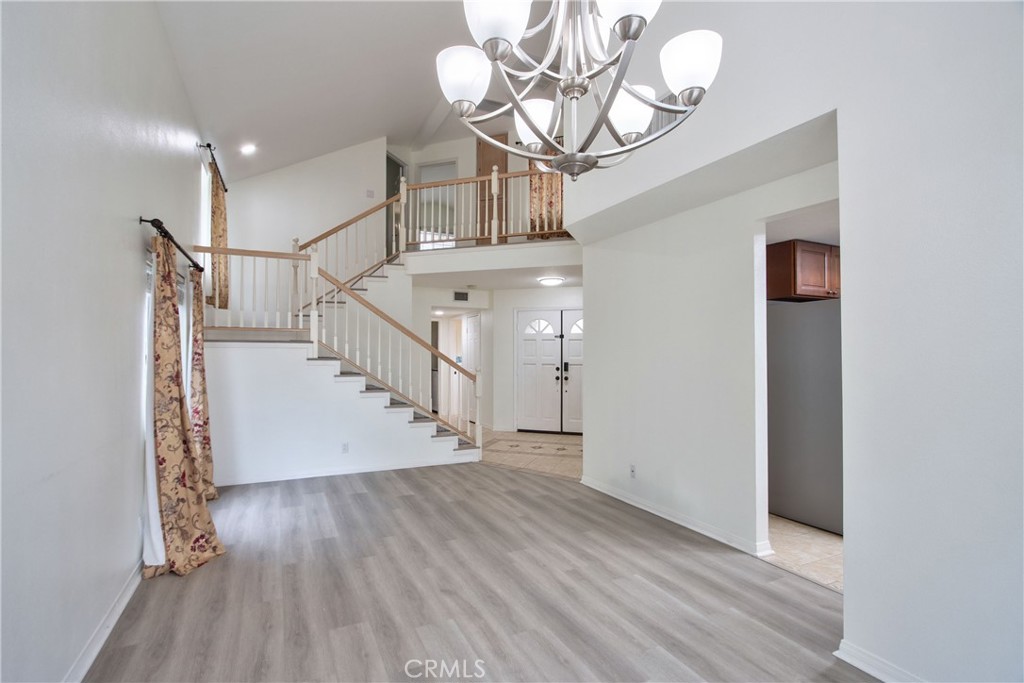 24055 Golden Pheasant Lane Murrieta, CA 92562 - Photo 5 of 38 a view of entryway and hall with wooden floor
