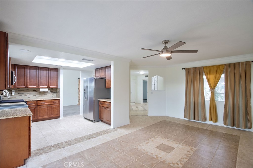 24055 Golden Pheasant Lane Murrieta, CA 92562 - Photo 10 of 38 a view of a kitchen with a sink and a window