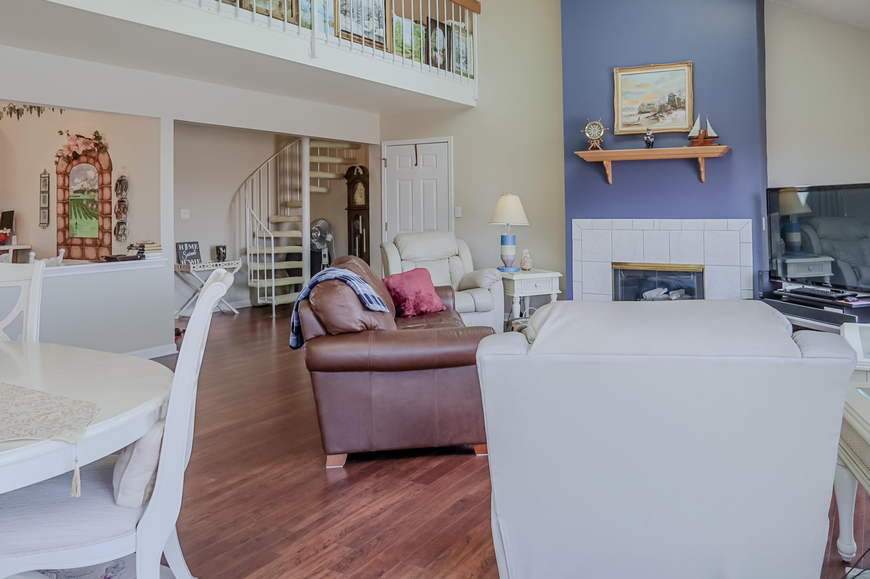 5065 Spinnaker Lane, Unit D Crown Point, IN 46307 - Photo 2 of 42 a living room with furniture and a fireplace
