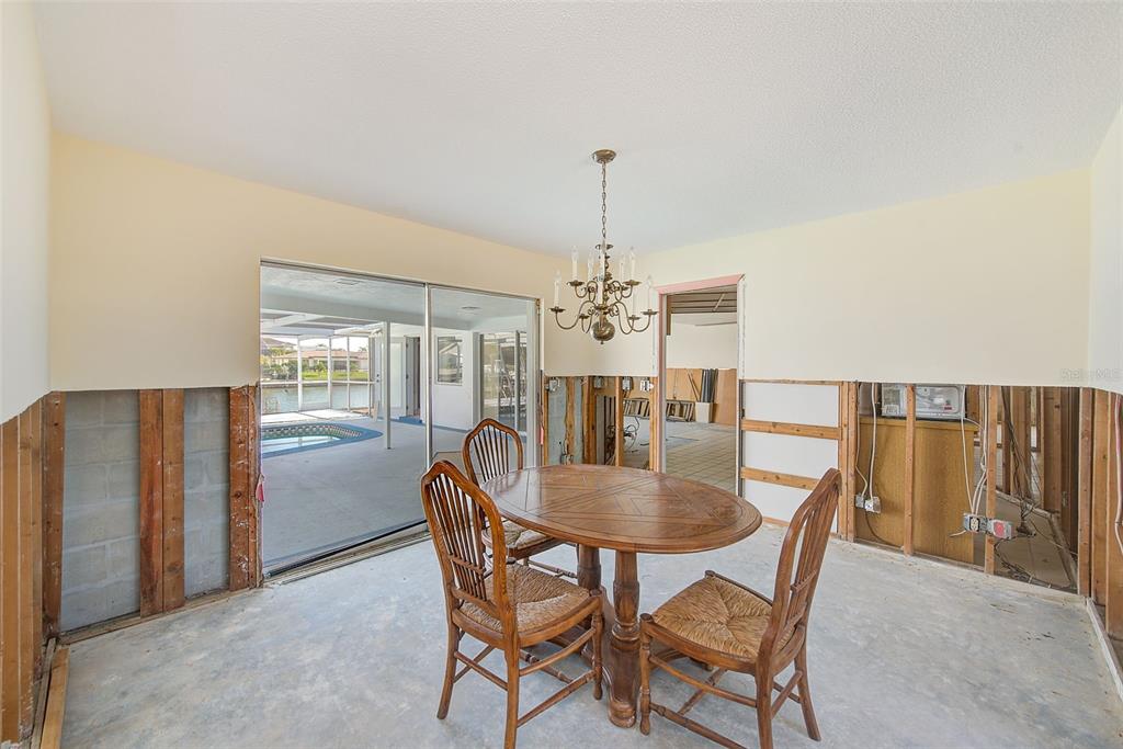 767 Island Way Clearwater, FL 33767 - Photo 11 of 74 a dining room with furniture and window