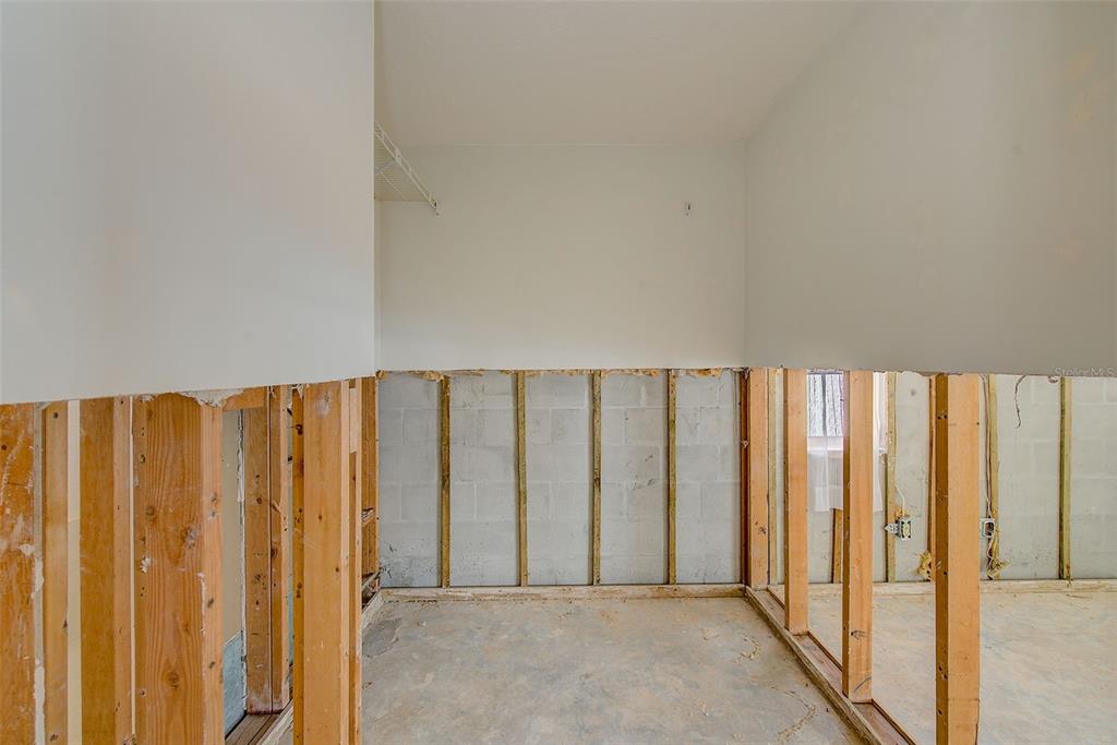 767 Island Way Clearwater, FL 33767 - Photo 36 of 74 a view of a room with a large window and stairs