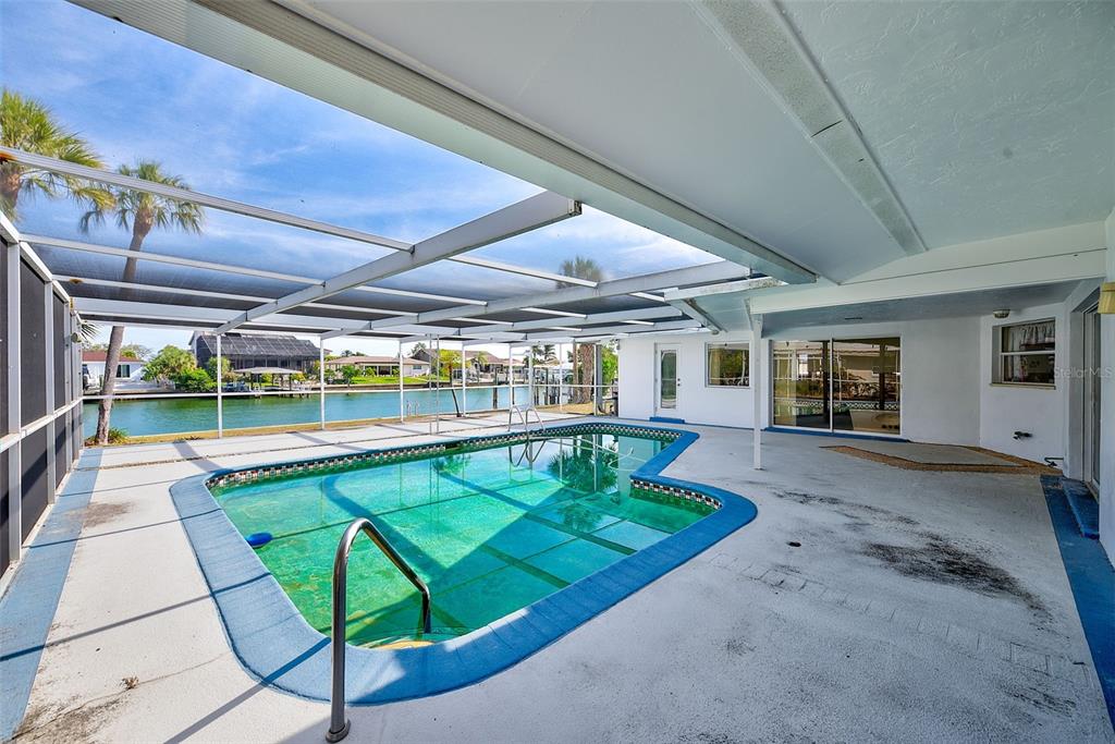 767 Island Way Clearwater, FL 33767 - Photo 39 of 74 a view of swimming pool with a patio