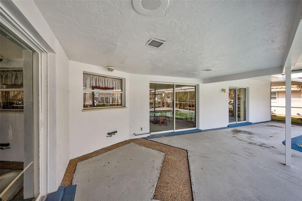 767 Island Way Clearwater, FL 33767 - Photo 41 of 74 a view of a livingroom with wooden floor and windows