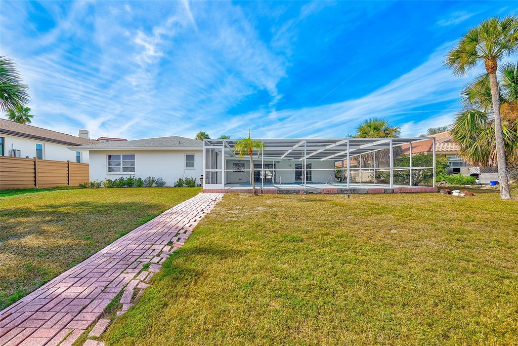 767 Island Way Clearwater, FL 33767 - Photo 51 of 74 a view of house with a swimming pool