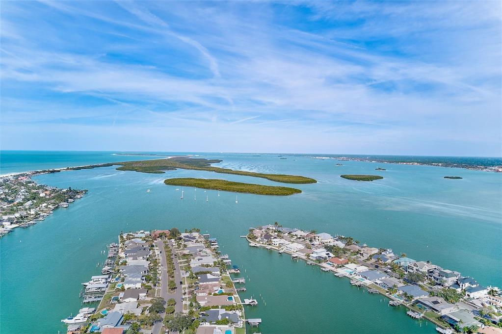 767 Island Way Clearwater, FL 33767 - Photo 61 of 74 a view of a lake with a big yard