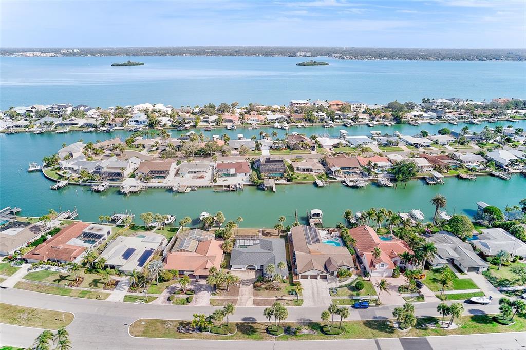 767 Island Way Clearwater, FL 33767 - Photo 63 of 74 an aerial view of a house with a lake view