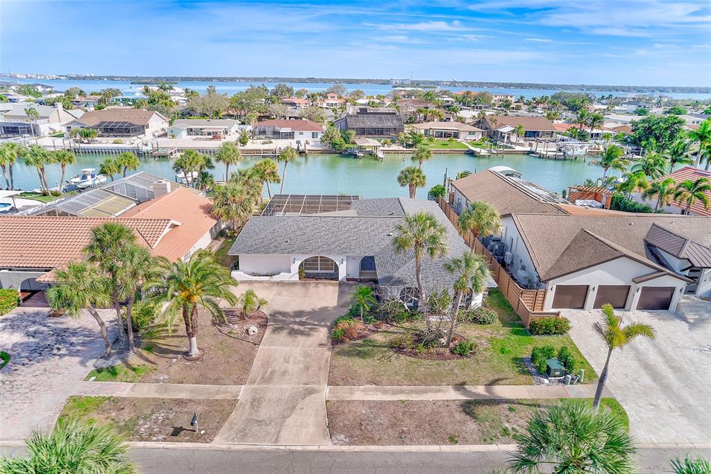 767 Island Way Clearwater, FL 33767 - Photo 68 of 74 an aerial view of a house with outdoor space and lake view