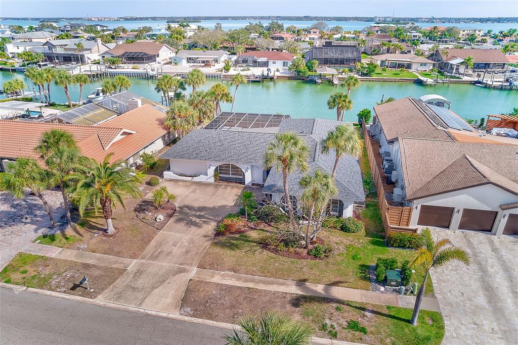 767 Island Way Clearwater, FL 33767 - Photo 69 of 74 an aerial view of a house with outdoor space and lake view