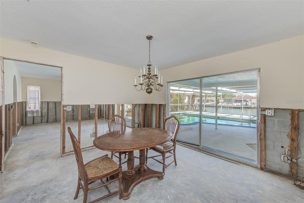 767 Island Way Clearwater, FL 33767 - Photo 10 of 74 a dining room with furniture window and outside view