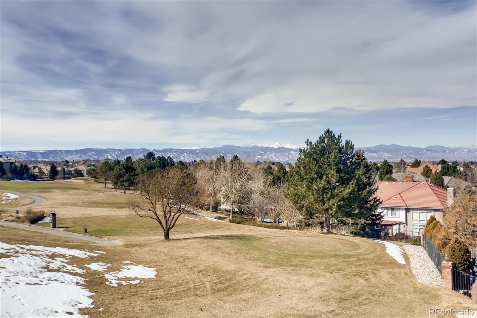 8618 Colonial Drive Lone Tree, CO 80124 - Photo 38 of 39 a view of a lake with a mountain