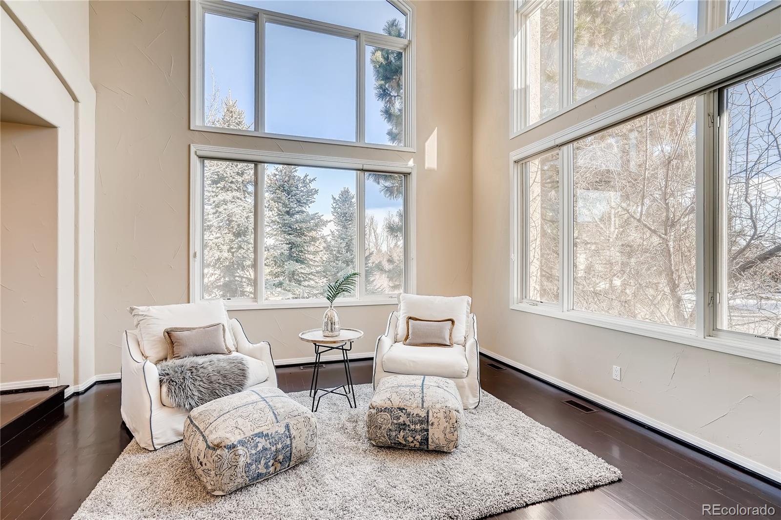 8618 Colonial Drive Lone Tree, CO 80124 - Photo 4 of 39 a living room with furniture and a large window