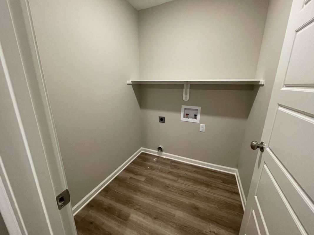 102 Stone Brook Cove Ripley, TN 38063 - Photo 10 of 19 a view of small space with empty racks