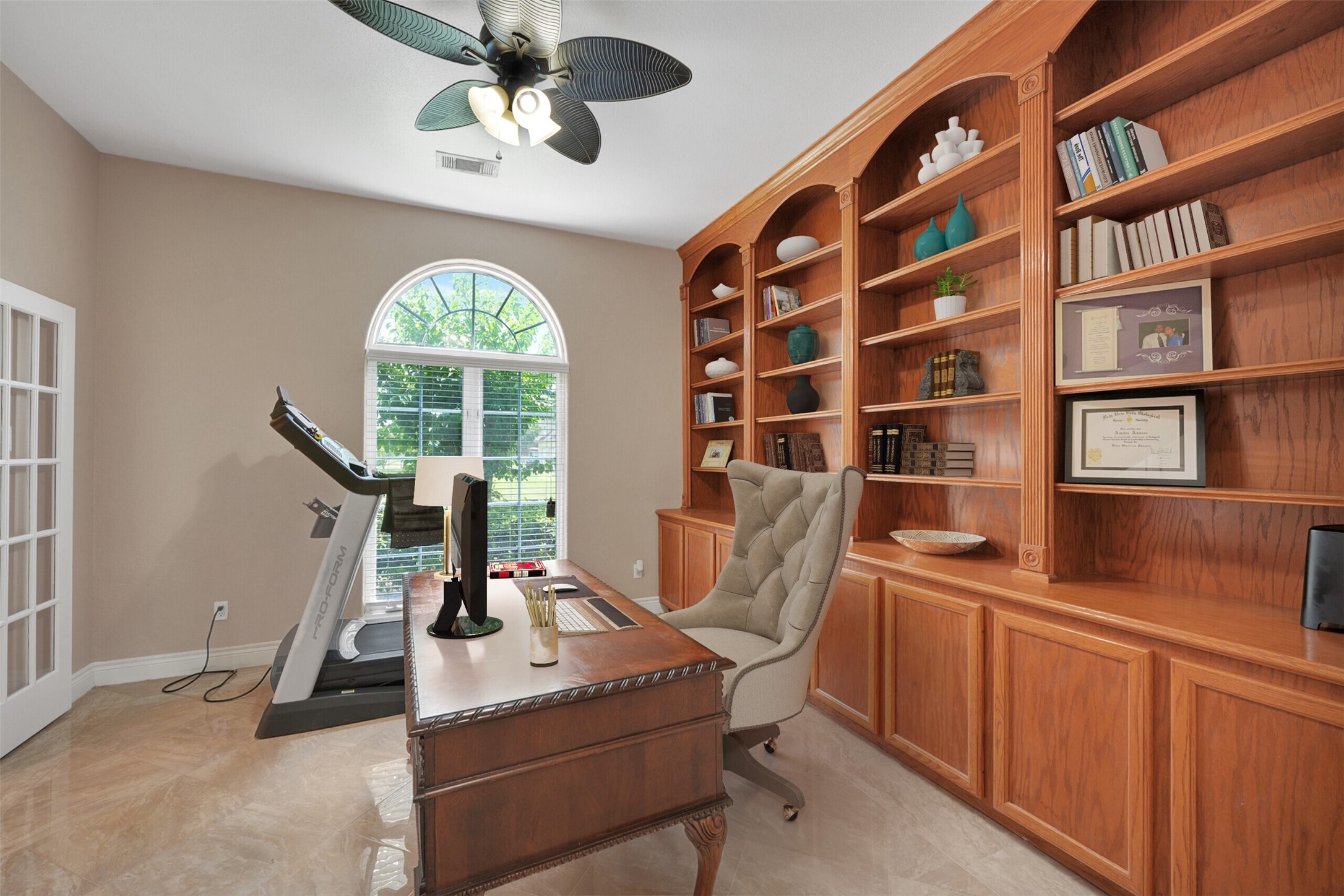 2750 County Road 48 Rosharon, TX 77583 - Photo 19 of 40 a view of a livingroom with furniture and a bookshelf