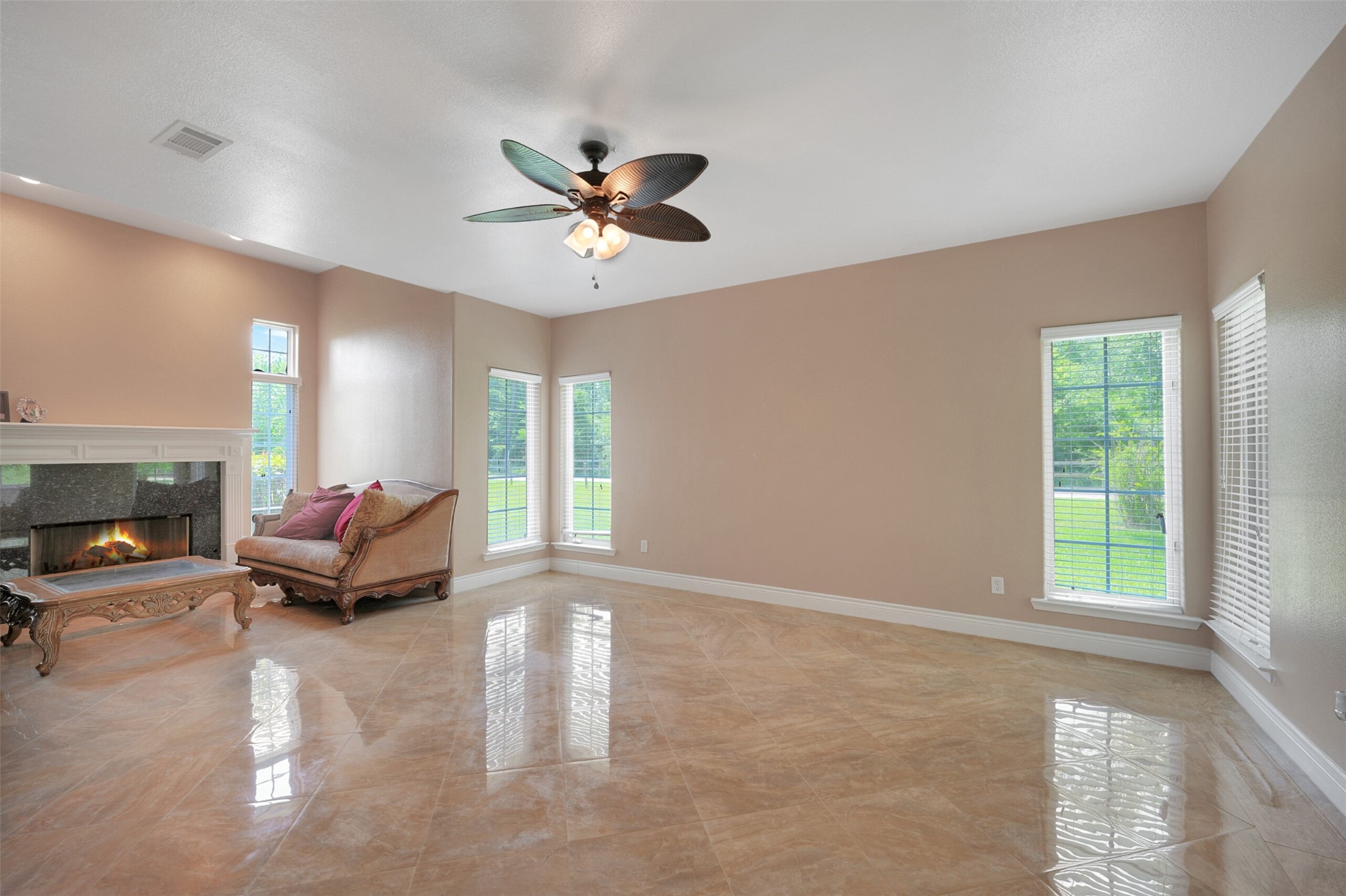 2750 County Road 48 Rosharon, TX 77583 - Photo 23 of 40 a living room with furniture wooden floor and a window