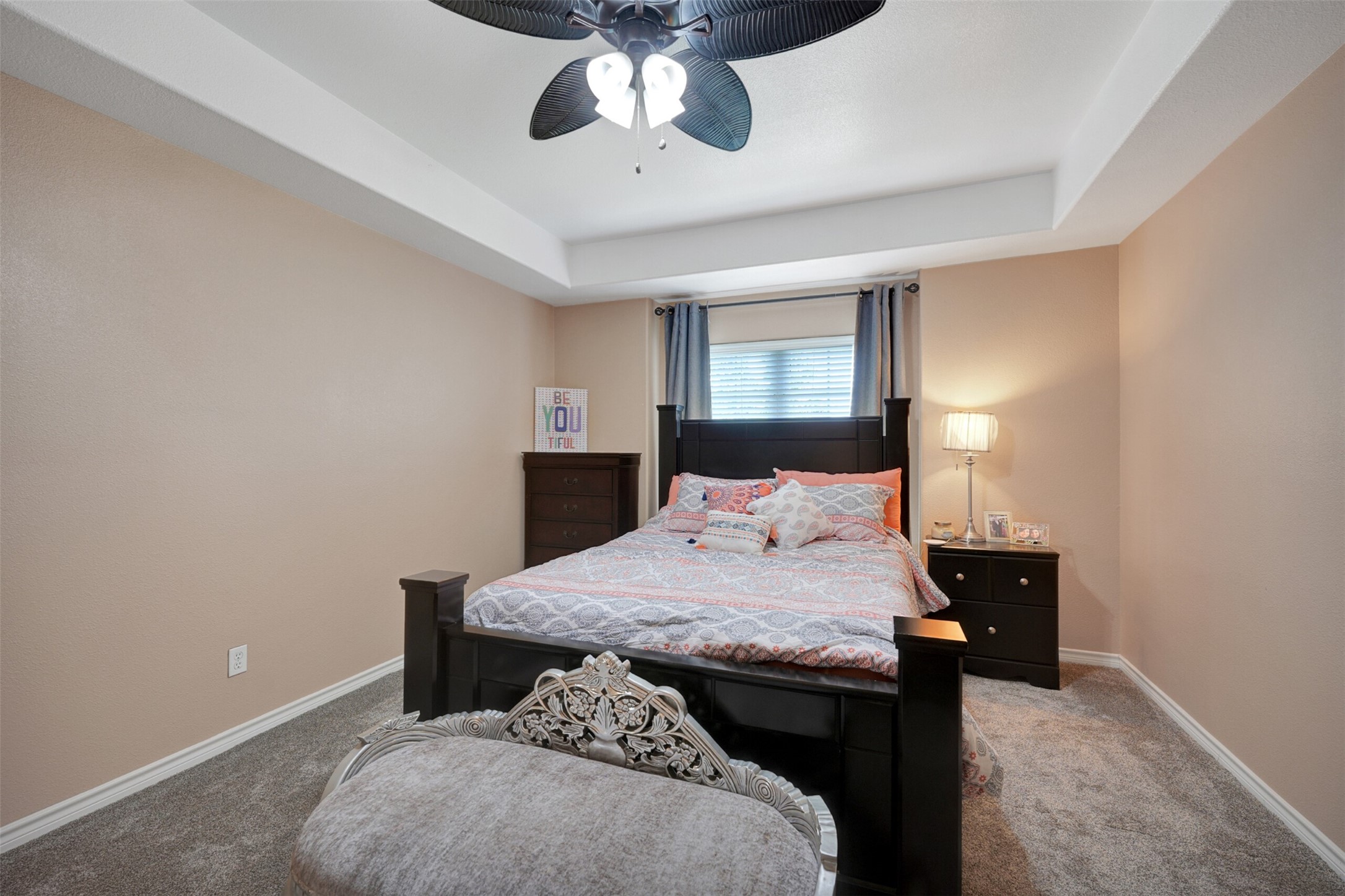 2750 County Road 48 Rosharon, TX 77583 - Photo 28 of 40 a bedroom with a bed and a chandelier