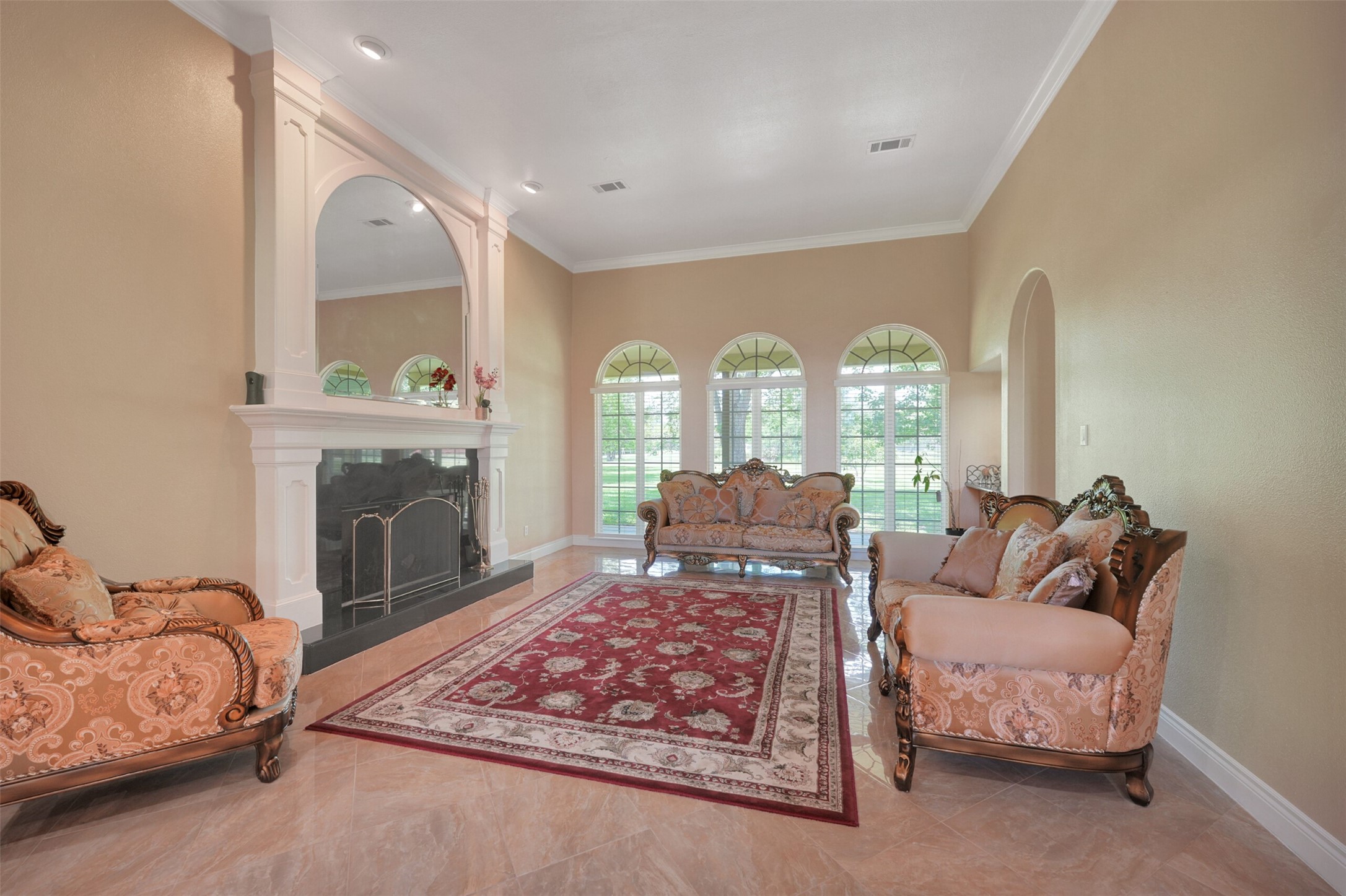 2750 County Road 48 Rosharon, TX 77583 - Photo 9 of 40 a living room with furniture and a fireplace
