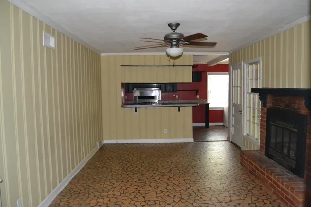 a view of a kitchen with a sink cabinets and window