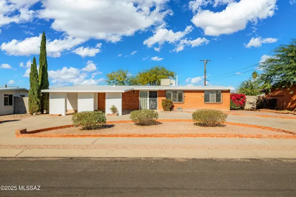 a front view of a house with entertaining space