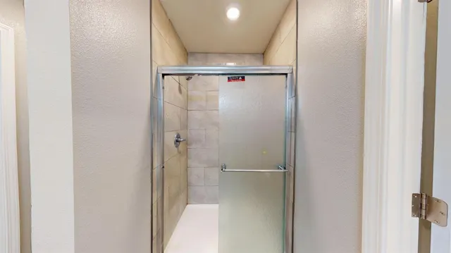 a bathroom with a toilet and a sink