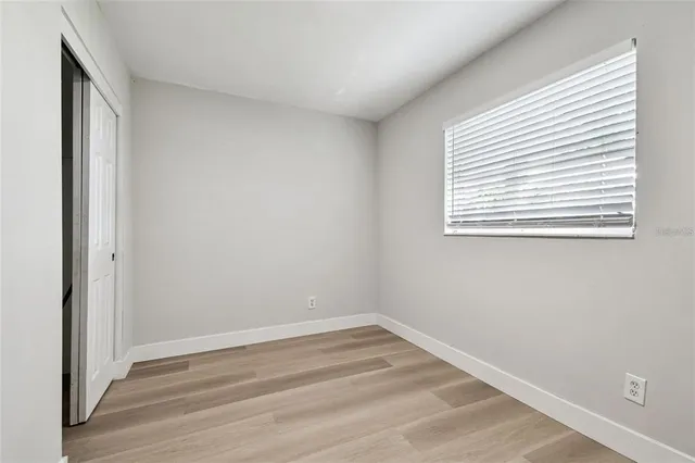 a view of a room that has a window in it