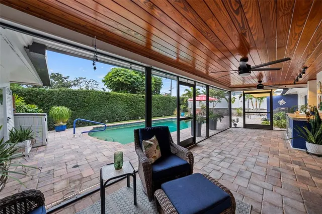 a bathroom with a sink a toilet and a shower curtain